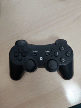 PlayStation 3 Superslim 500GB + 2 Mandos