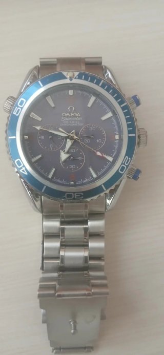 Omega Reloj Azul y Plateado
