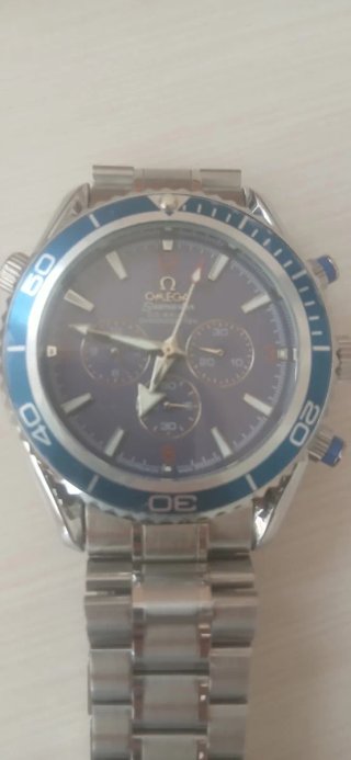 Omega Reloj Azul y Plateado