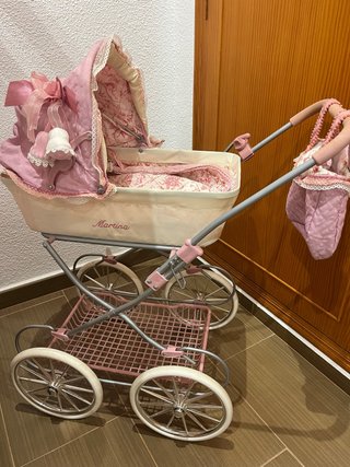 Carrito de muñecas rosa Martina