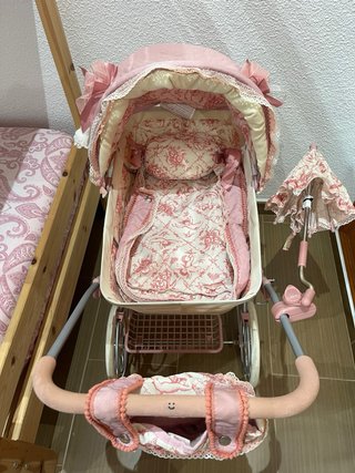 Carrito de muñecas rosa Martina