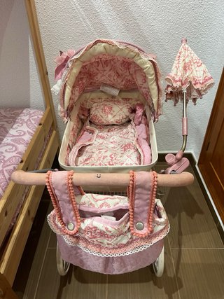 Carrito de muñecas rosa Martina