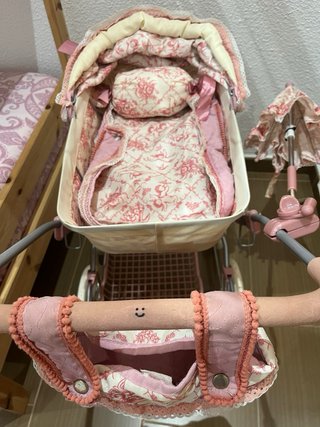 Carrito de muñecas rosa Martina