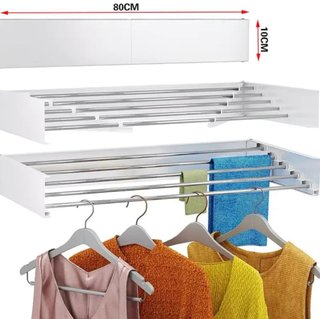 Tendedero plegable de pared blanco.