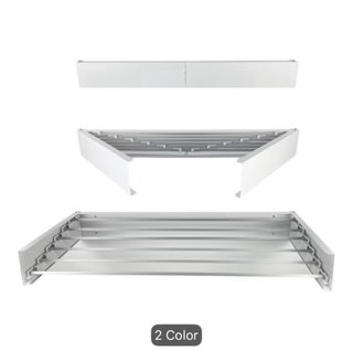 Tendedero plegable de pared blanco.