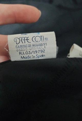 Abrigo negro de pelo sintético. Negociable