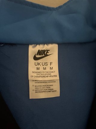 Conjunto deportivo Nike azul y negro