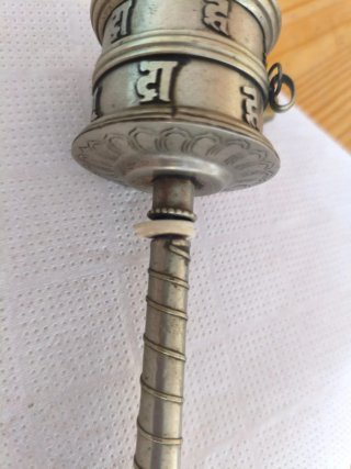 Rueda de oración tibetano de metal