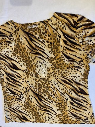 Camiseta vestir LEGEND animal print con brillos