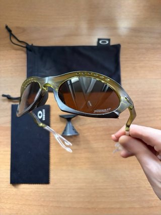 Occhiali da sole Oakley marrone/verde oliva