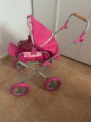 Carro de juguete rosa