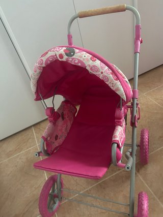 Carro de juguete rosa