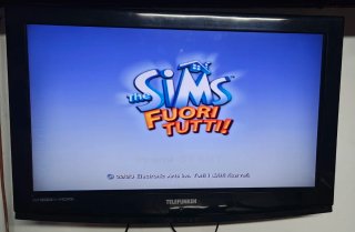 PlayStation 2 Slim Nera + Gioco Sims