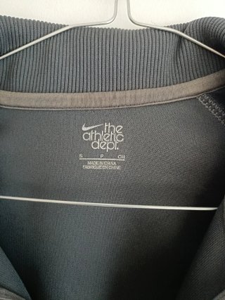 Chaqueta deportiva Nike gris y blanca Talla S