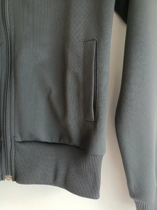 Chaqueta deportiva Nike gris y blanca Talla S