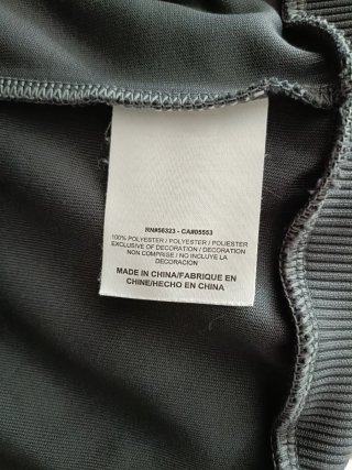 Chaqueta deportiva Nike gris y blanca Talla S