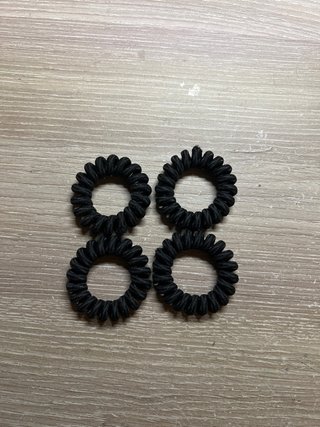 Gomas de pelo en espiral negras (4 unidades)