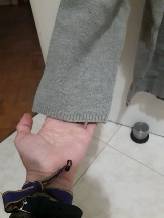 Jersey oversize gris cuello pico