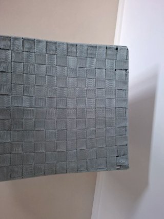 Cesto de roupa cinzento