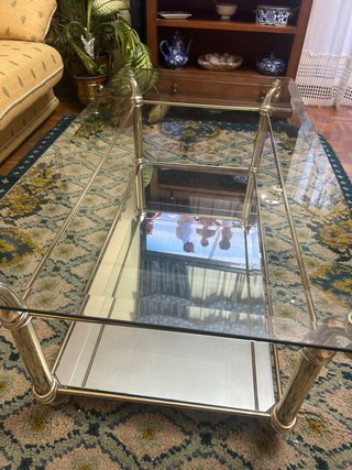 Mesa de centro cristal y metal dorado
