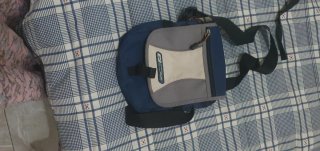 Bolsito bandolera Reebok azul y gris