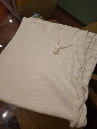 Saco para bebé, toquilla y impermeable.