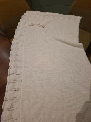 Saco para bebé, toquilla y impermeable.