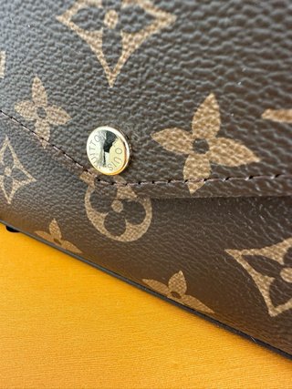 Louis Vuitton Pochette Marrón y Rojo