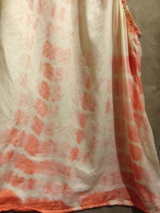 Blusa de seda naranja y blanca
