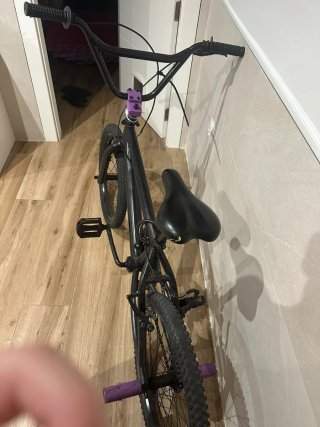 Bicicleta BMX Negra i morada   cambio por patin