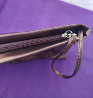Bolso de mano.