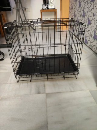 Jaula para animales negra sin usar