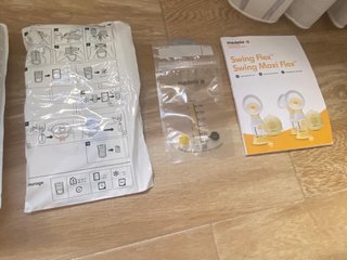 Sacaleches Medela Swing Flex + 4 botes +25 bolsas