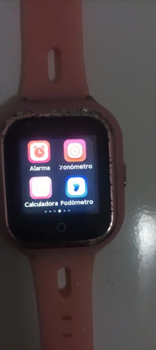 Reloj móvil rosa con todo lo necesario