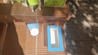 Casita de muñecas de madera