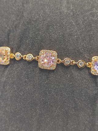 Pulsera Xuping 14k con Circonitas Moradas y Rosas