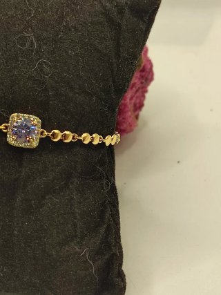 Pulsera Xuping 14k con Circonitas Moradas y Rosas