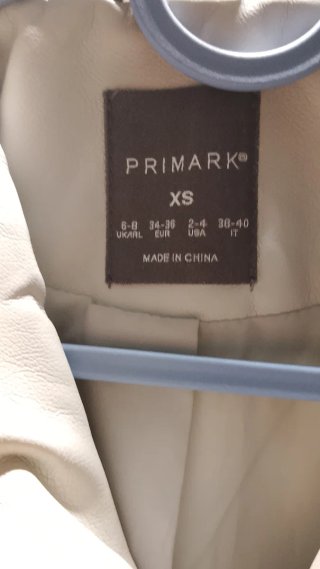 Chaqueta sintética beige Primark Talla XS