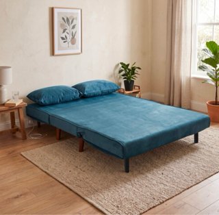 Sofá cama de terciopelo azul