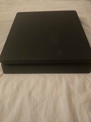 Consola PS4 Slim 1TB Negra + 4 Juegos
