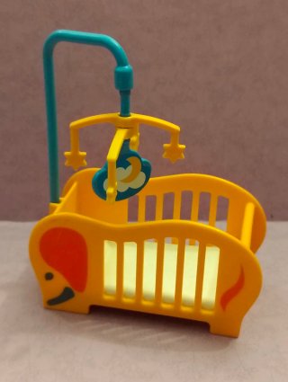 Cuna de juguete Playmobil con móvil