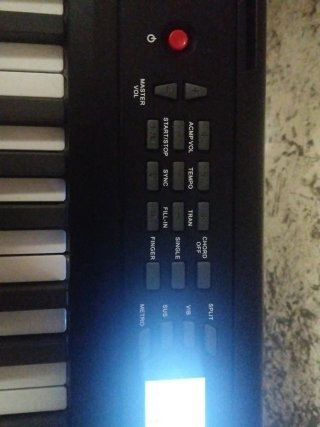 Piano con soporte y taburete