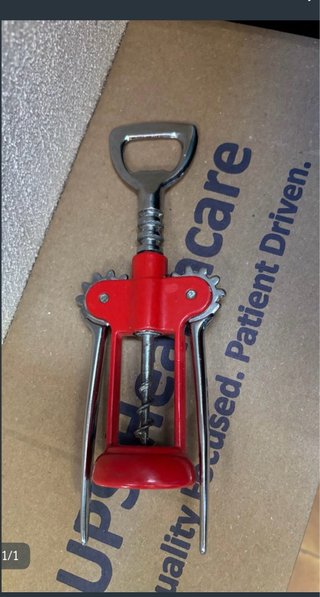 Cavatappi apribottiglie rosso e argento