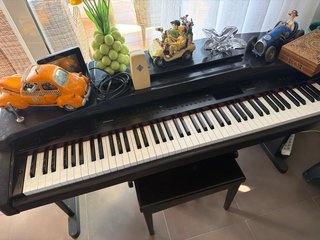 Piano Yamaha CVP65 con banqueta