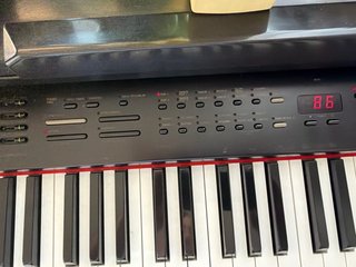 Piano Yamaha CVP65 con banqueta