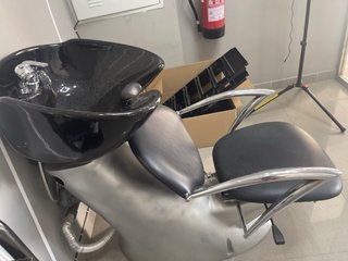 Lavabo de peluquería con silla