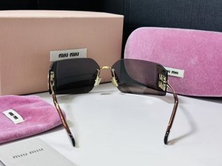 Gafas de sol Miu Miu Marrón y Dorado