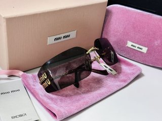 Gafas de sol Miu Miu Marrón y Dorado