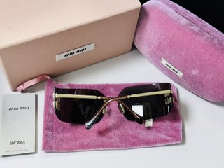 Gafas de sol Miu Miu Marrón y Dorado
