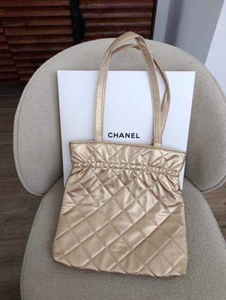Pochette Chanel Oro
